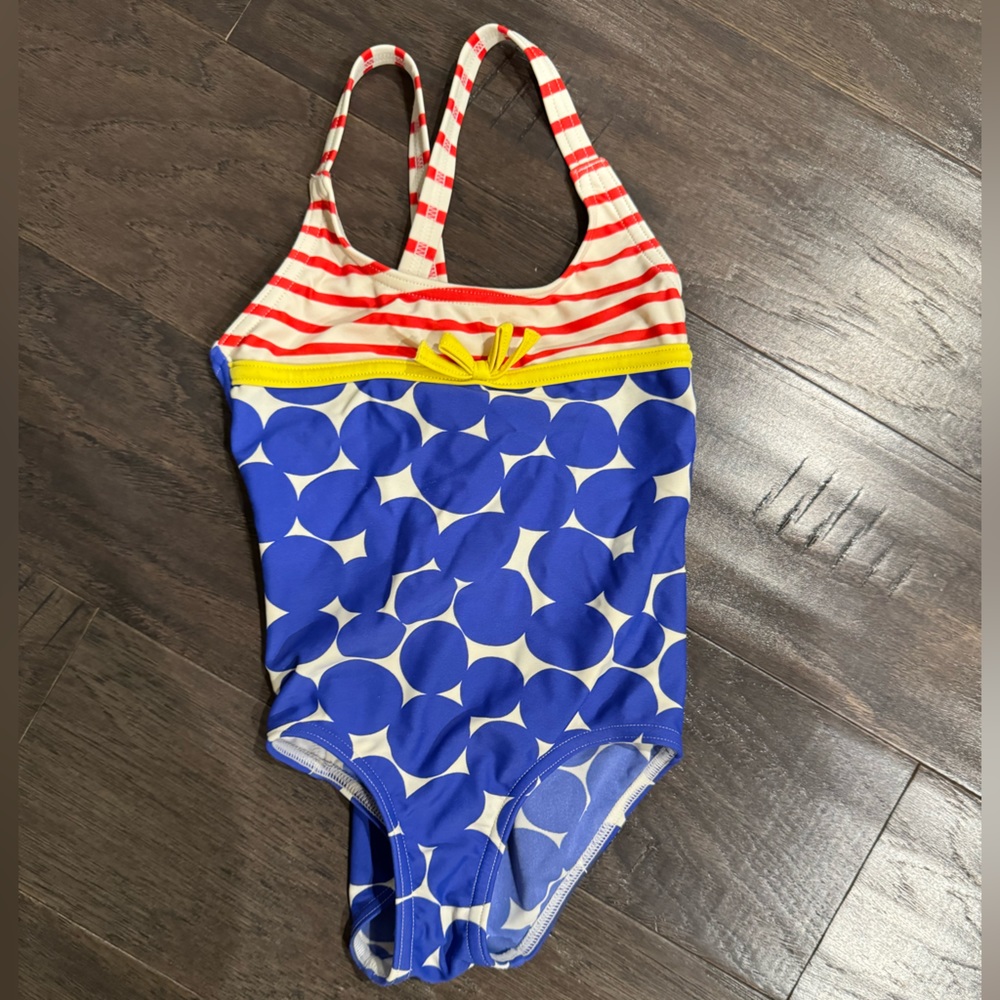 Cute one piece swimming suit.